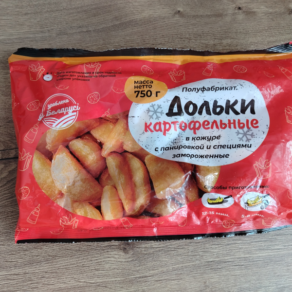 Полуфабрикат. Дольки картофельные в кожуре с панировкой и специями замороженные